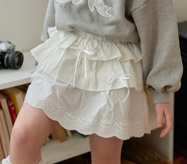 Cream skirt.