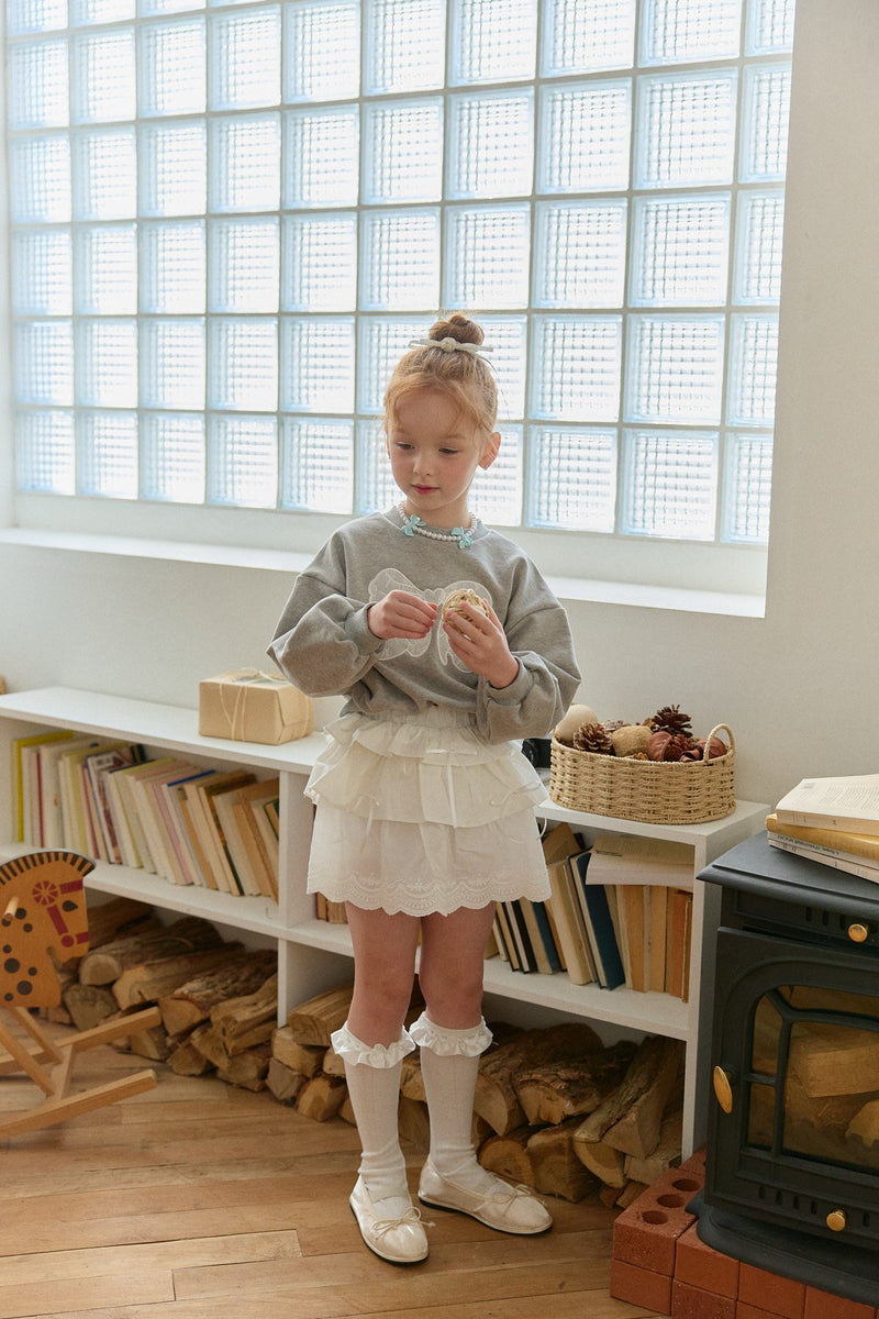 Cream skirt.